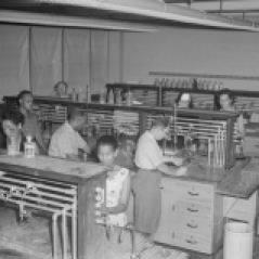 Classroom. Unidentified men and women in lab classroom, ca. 1947. Paul Henderson, HEN.00.B2-251.